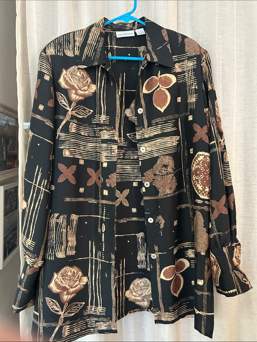 Silk blouse with French cuffs.
